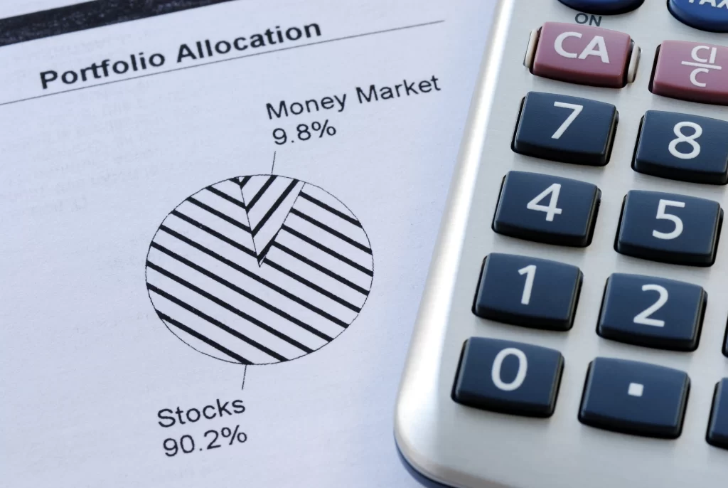 page of Portfolio allocation of MMF and stocks with a calculator by the side