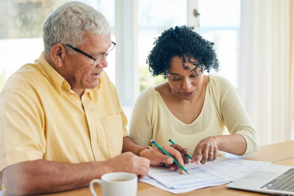 paperwork-budget-and-senior-couple-at-home-for-retirement-
