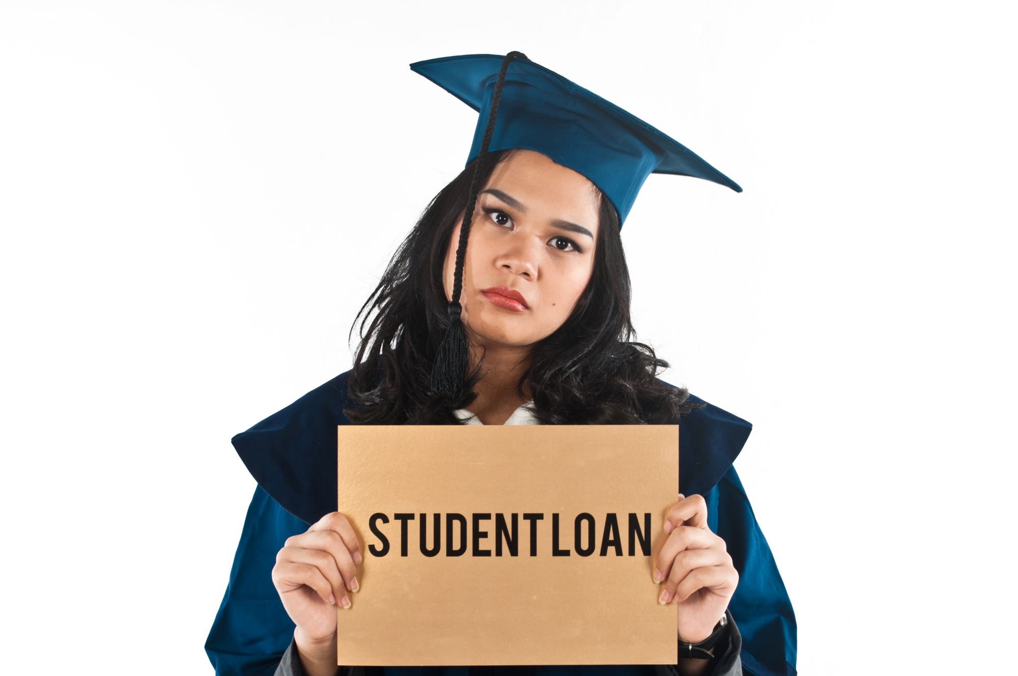 A young lady holding a sign of student loan debt
