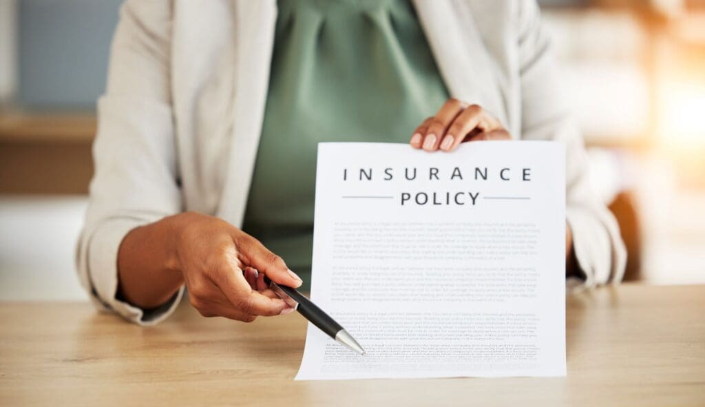 insurance-policy-hand-and-consultant-with-agreement-