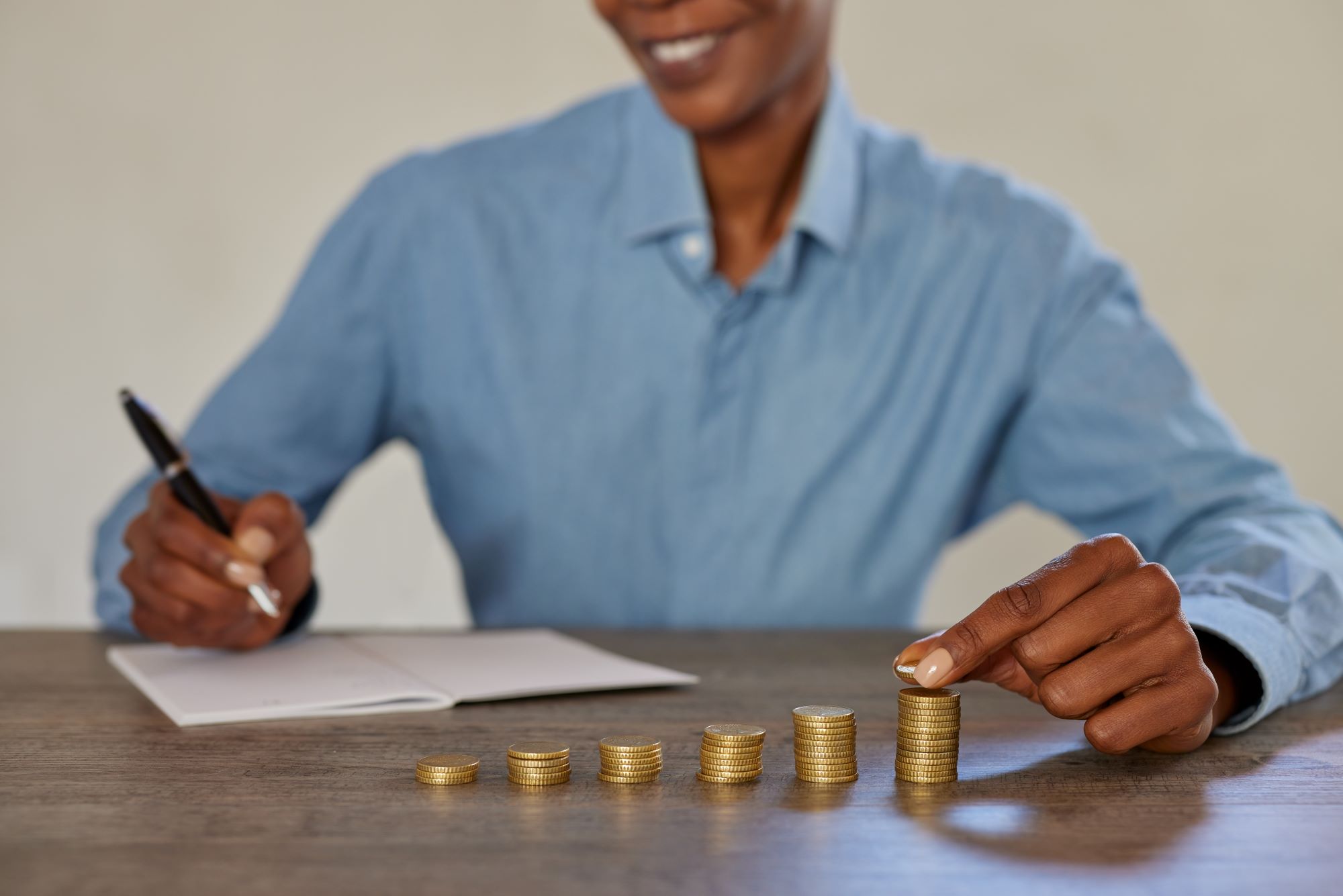 Woman counting money after good investment-Investing in Bills